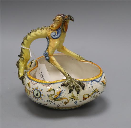 A Cantagalli majolica trefoil bowl, the handle modelled as a grotesque bird H 19cm W 18cm